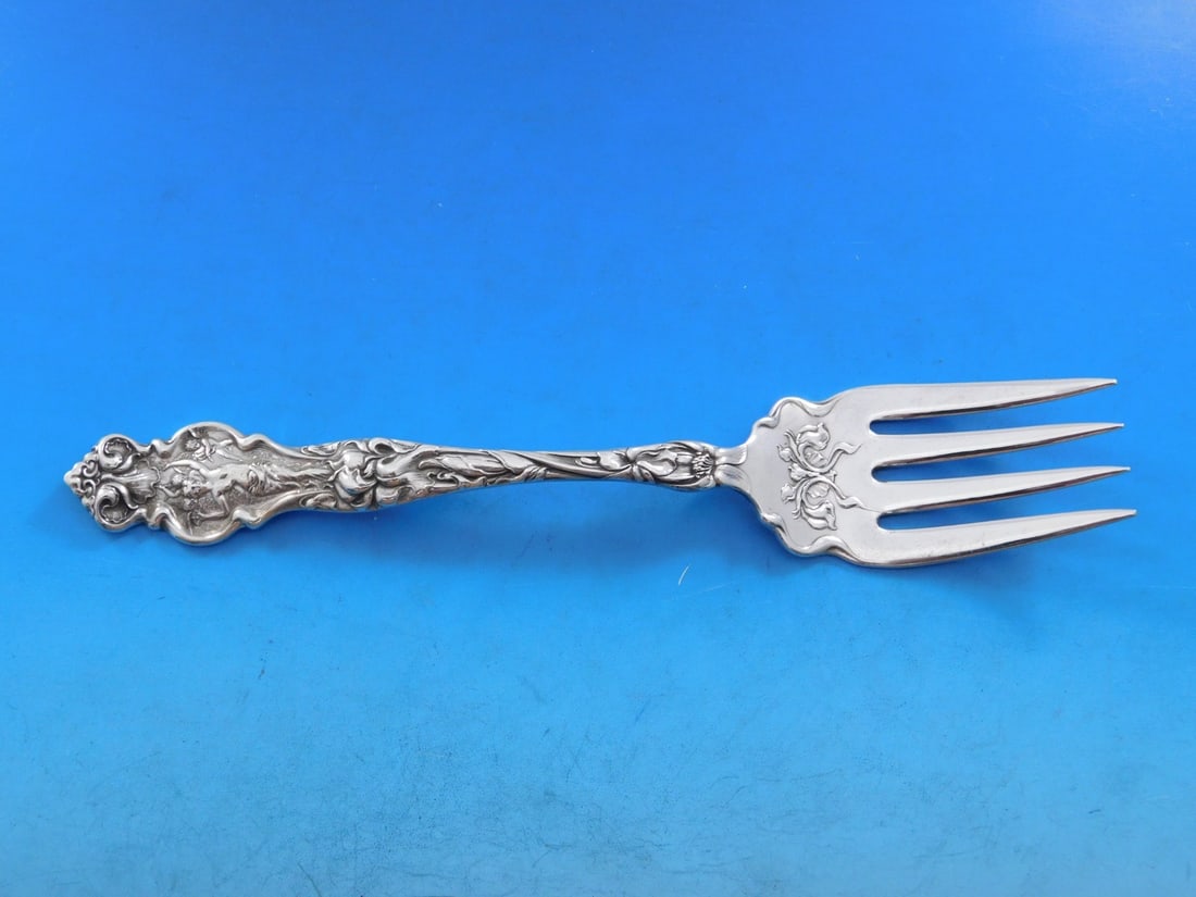 Wallace Irian Art Nouveau Sterling Silver Cold Meat Fork 8.25": Wallace Irian Art Nouveau Sterling Silver Cold Meat Fork 8.25" This exquisite cold meat fork from the Irian pattern by Wallace is a stunning example of Art Nouveau design. Crafted from high-quality st