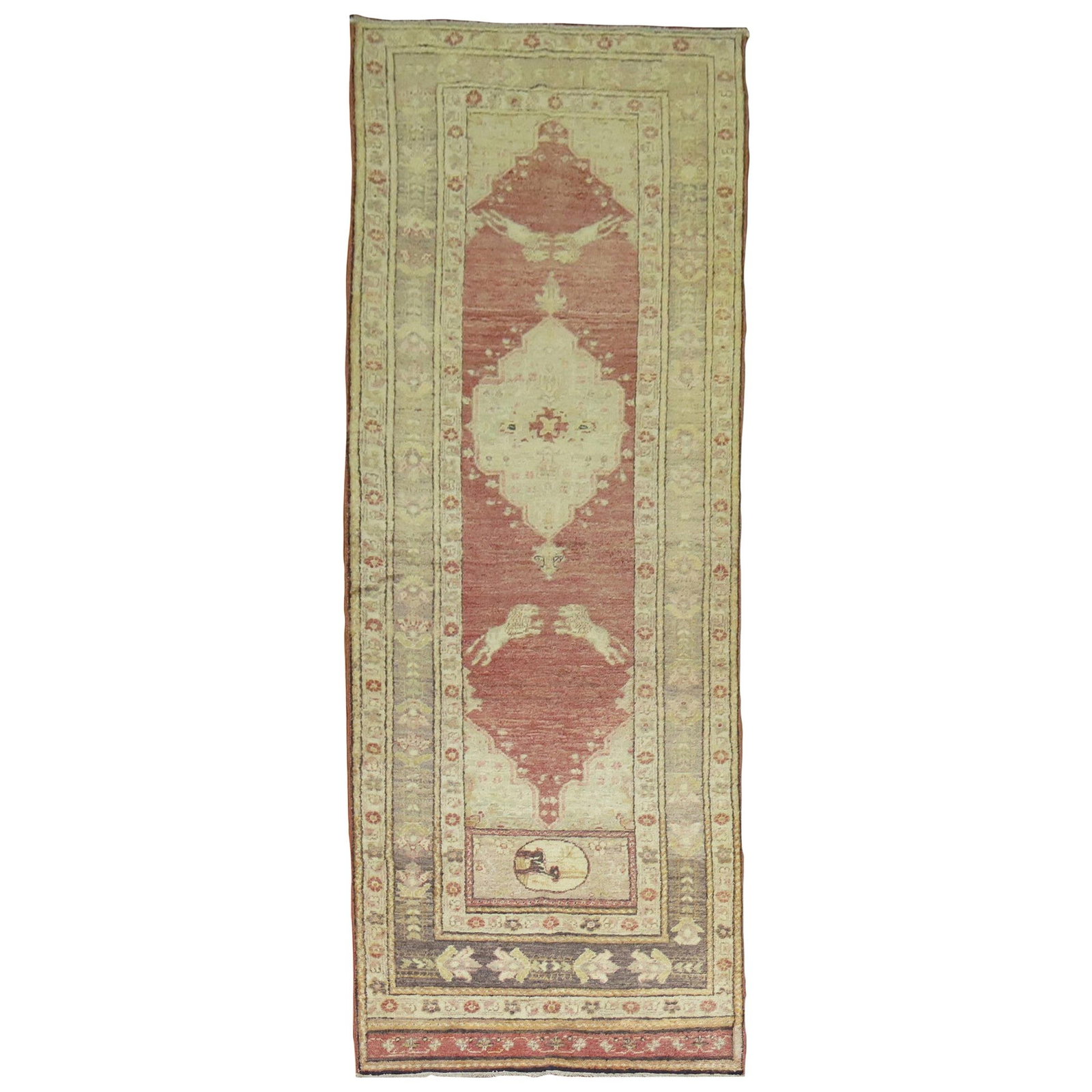 Turkish Hand Woven Wool Runner Lion Pictorial 3'4 x 10'7: Turkish Hand Woven Wool Runner Lion Pictorial 3'4 x 10'7 This hand-woven Turkish runner from the early 20th century features an expressionist design with four lions depicted between a central medallio