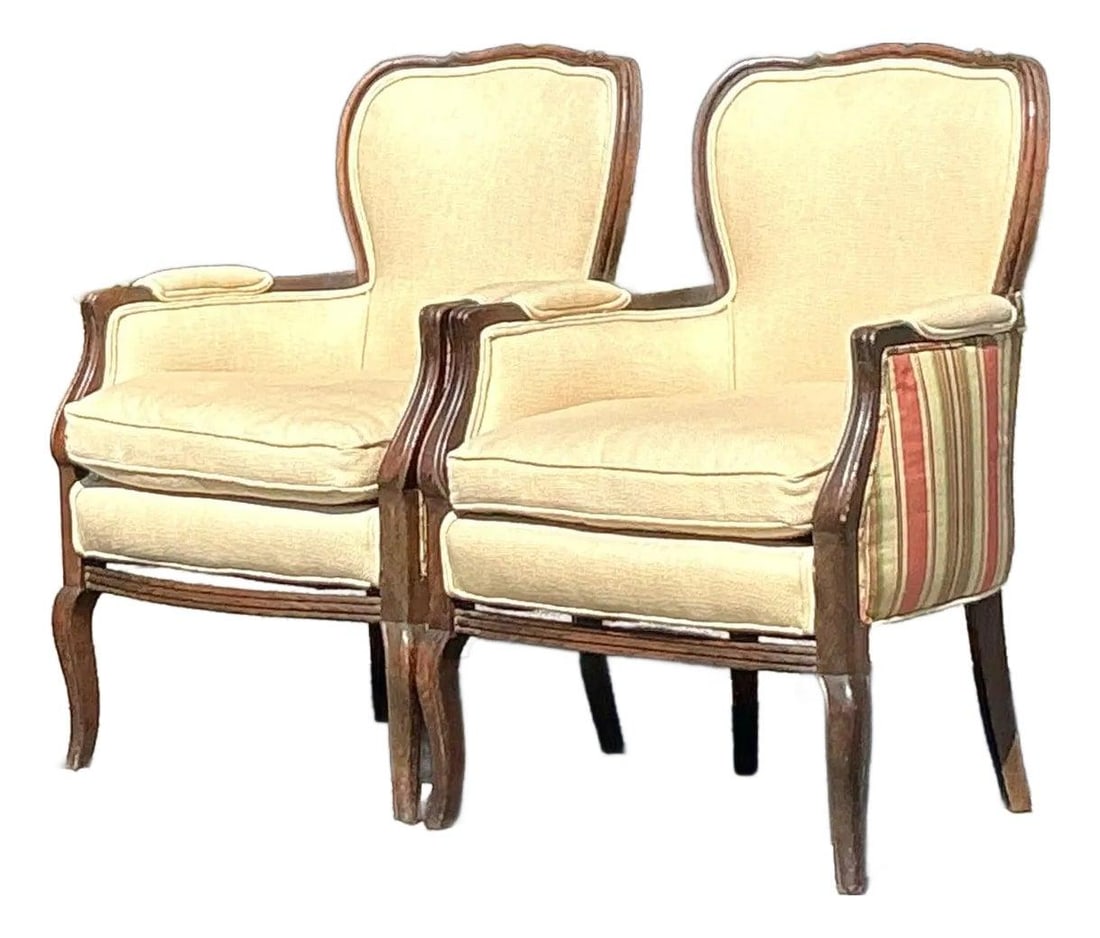 Elegant Vintage Regency Striped Bergere Chair Pair: Elegant Vintage Regency Striped Bergere Chair Pair Experience the elegance of a bygone era with this pair of Vintage Regency Striped Bergere Chairs. These timeless accent pieces showcase a gracefully 