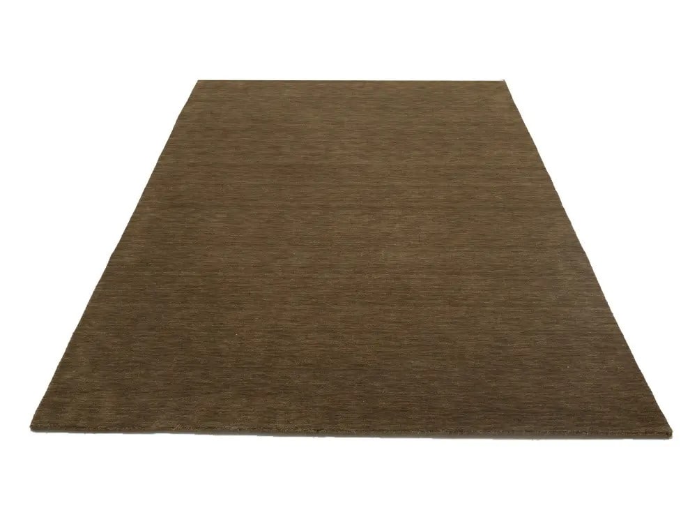 6'1 x 8'11 Modern Gabbeh Wool Hand-Loomed Brown Area Rug from India: 6'1 x 8'11 Modern Gabbeh Wool Hand-Loomed Brown Area Rug from India This hand-loomed Gabbeh area rug features a solid brown color, crafted from wool for a soft and durable texture. With a modern desig