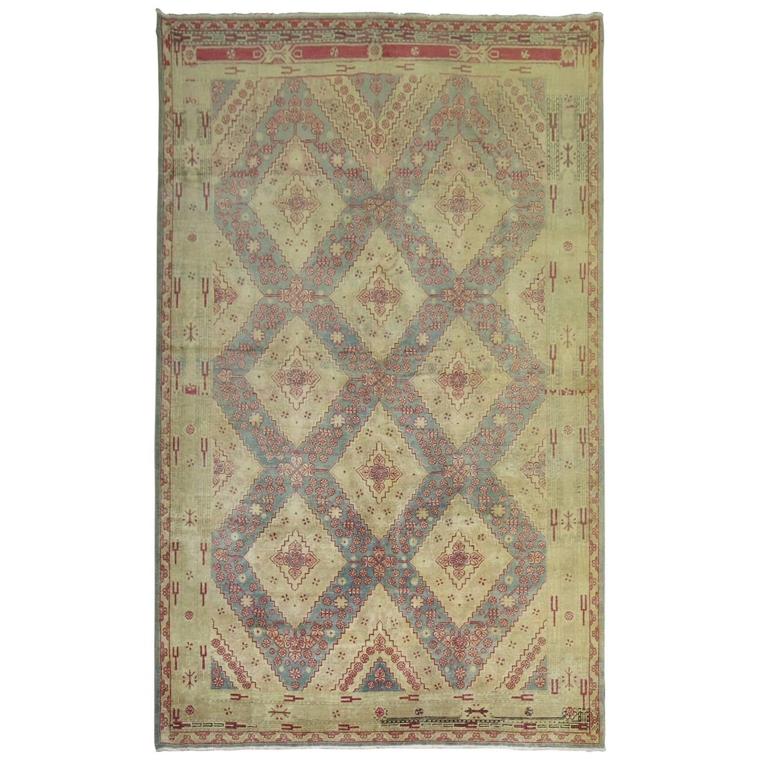 Taisho Wool Hand-Knotted Khotan Rug 74 x 117 in: Taisho Wool Hand-Knotted Khotan Rug 74 x 117 in This antique Khotan rug from East Turkestan features a unique geometric, abstract all-over design. Hand-knotted from wool, it dates back to the early 20