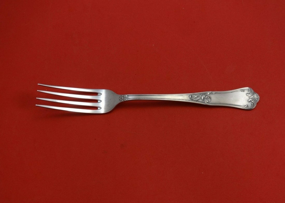 Ricci Bernini Satin Sterling Silver Vegetable Serving Fork 9 7/8": Ricci Bernini Satin Sterling Silver Vegetable Serving Fork 9 7/8" Elevate your dining experience with this exquisite 9 7/8" vegetable serving fork from Ricci, featuring the elegant Bernini Satin patte