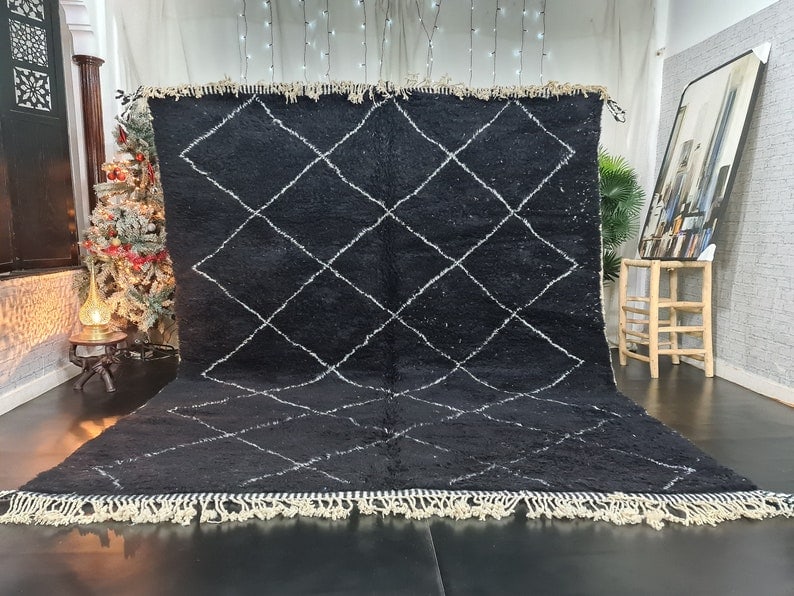 Handmade Moroccan Berber Wool Rug Black White Geometric 9.84x6.56ft: Handmade Moroccan Berber Wool Rug Black White Geometric 9.84x6.56ft Enhance your living space with this stunning Soft Black Handmade Moroccan Berber Wool Rug. This exquisite rug features a beautiful w