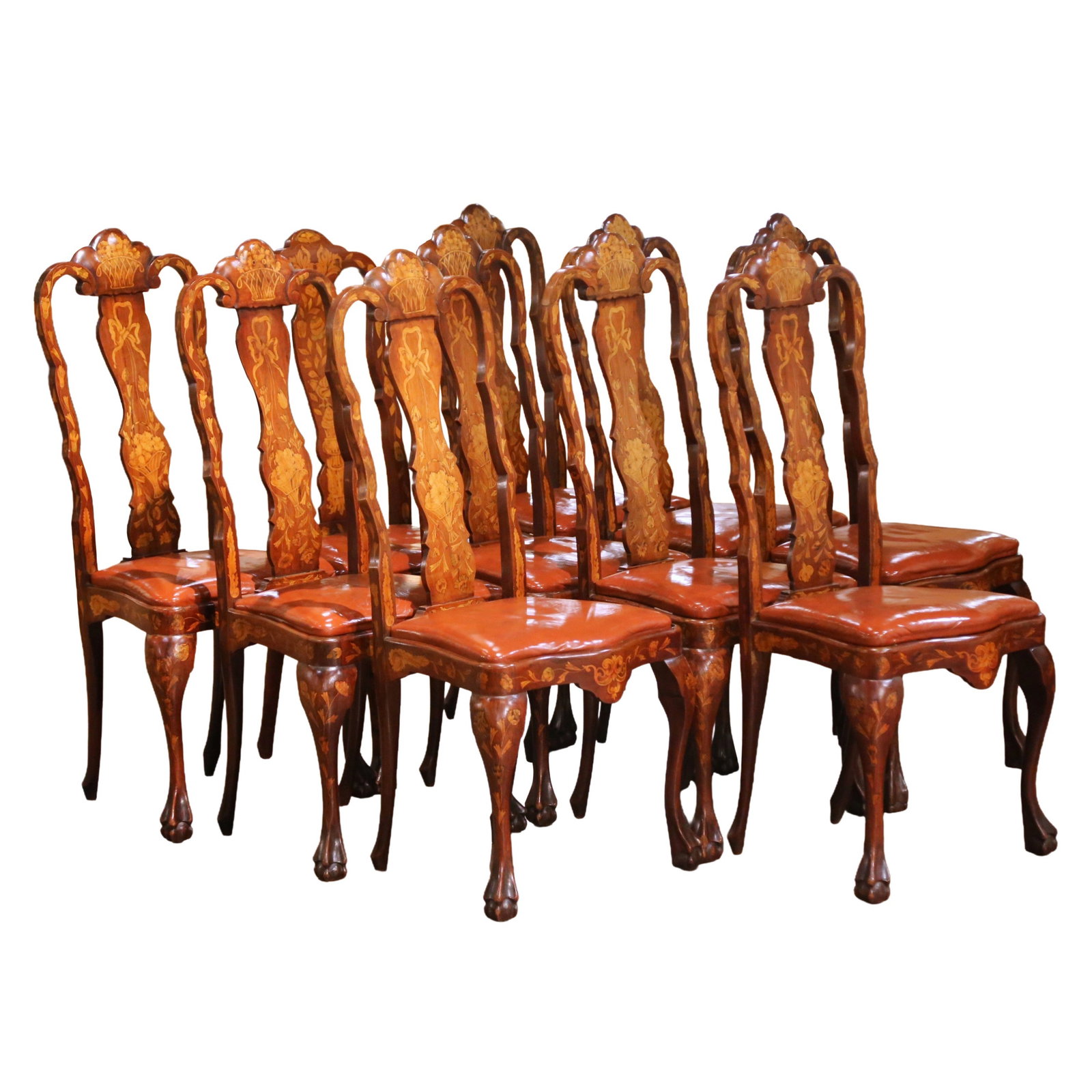Set of 10 Dutch Baroque Revival Walnut Inlaid Dining Chairs With Leather Upholstery: Set of 10 Dutch Baroque Revival Walnut Inlaid Dining Chairs With Leather Upholstery This set of ten late 19th-century Dutch Baroque Revival dining chairs features hand-carved solid walnut frames with 