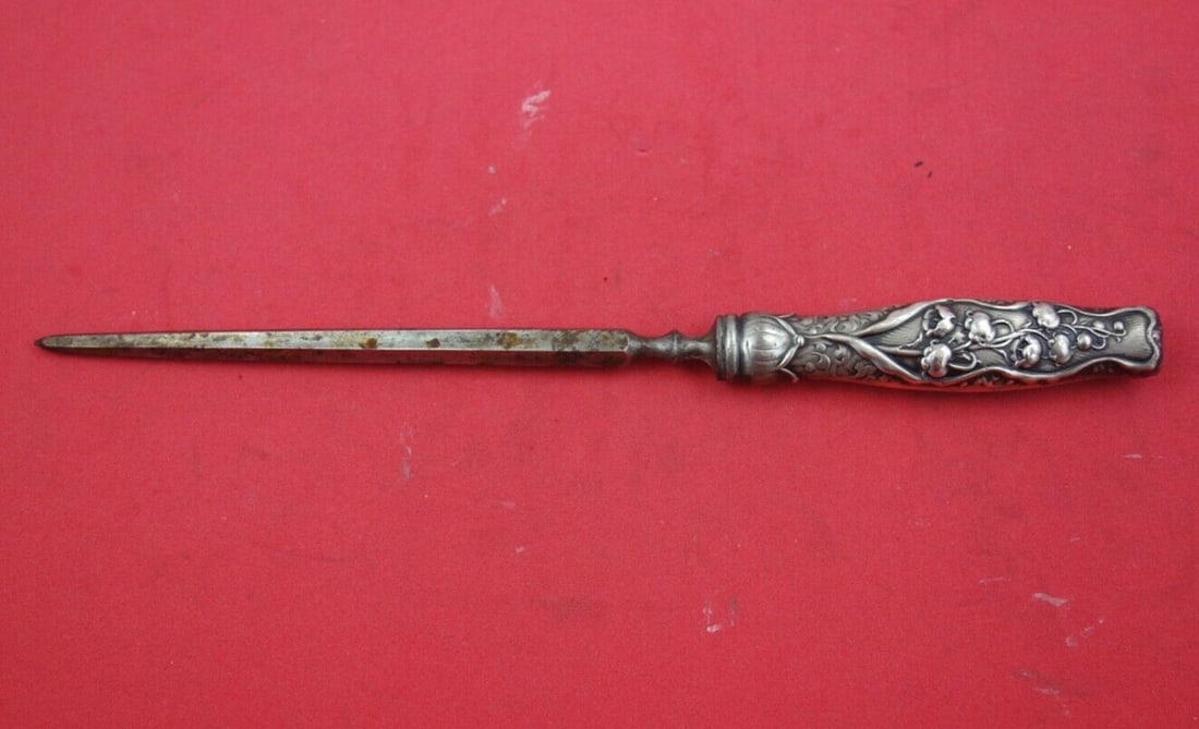 Whiting Sterling Silver Steak Carving Hone Lily of the Valley 9.5": Whiting Sterling Silver Steak Carving Hone Lily of the Valley 9.5" This exquisite steak carving hone features the elegant "Lily of the Valley" pattern by Whiting, crafted from high-quality sterling si