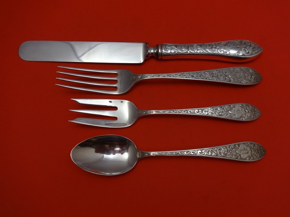 Whiting Colonial B Engraved Sterling Silver 4-Piece Place Setting: Whiting Colonial B Engraved Sterling Silver 4-Piece Place Setting This exquisite 4-piece place setting showcases the Colonial B Engraved pattern by Whiting. Crafted from high-quality sterling silver, 