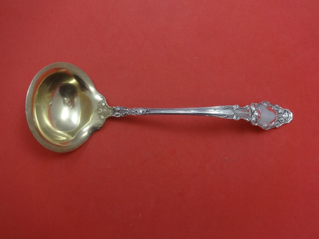 Gorham Virginiana Sterling Silver Gold Washed Soup Ladle 11": Gorham Virginiana Sterling Silver Gold Washed Soup Ladle 11" This exquisite soup ladle is part of the Virginiana pattern by Gorham, crafted from high-quality sterling silver and featuring a luxurious 