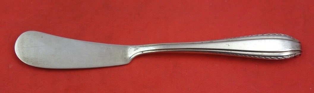 Wallace Rembrandt Sterling Silver Butter Spreader Flat Handle 5 3/4": Wallace Rembrandt Sterling Silver Butter Spreader Flat Handle 5 3/4" This exquisite butter spreader features a flat handle and is crafted from high-quality sterling silver in the elegant Rembrandt pat