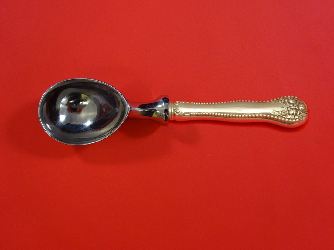Gorham Lancaster Sterling Silver Custom Ice Cream Scoop 7": Gorham Lancaster Sterling Silver Custom Ice Cream Scoop 7" Elevate your dessert service with this exquisite Lancaster ice cream scoop by Gorham. Crafted from sterling silver with a hollow handle and f