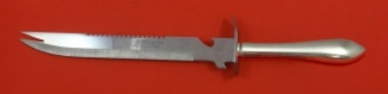 Dominick & Haff Pointed Antique Sterling Silver Ham Slice Knife 11 5/8": Dominick & Haff Pointed Antique Sterling Silver Ham Slice Knife 11 5/8" Experience the elegance of dining with the Pointed Antique ham slice by Dominick and Haff, crafted from high-quality sterling si