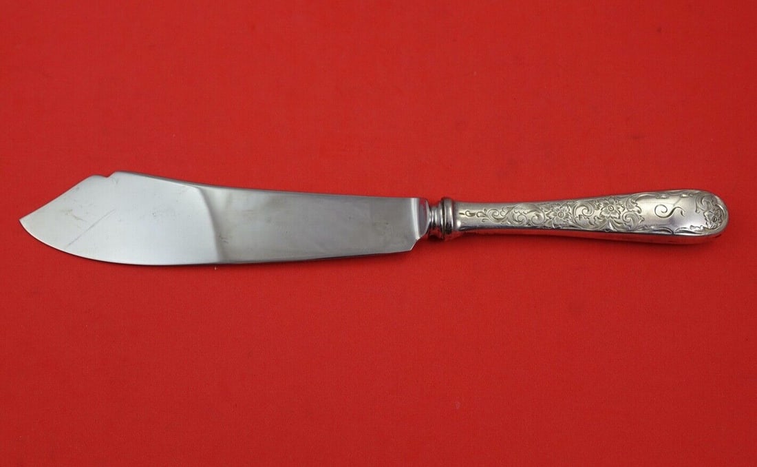 Kirk Old Maryland Engraved Sterling Silver Cake Knife 10 1/4in: Kirk Old Maryland Engraved Sterling Silver Cake Knife 10 1/4in This exquisite cake knife features the classic Old Maryland Engraved pattern by Kirk, crafted from sterling silver with a stainless steel