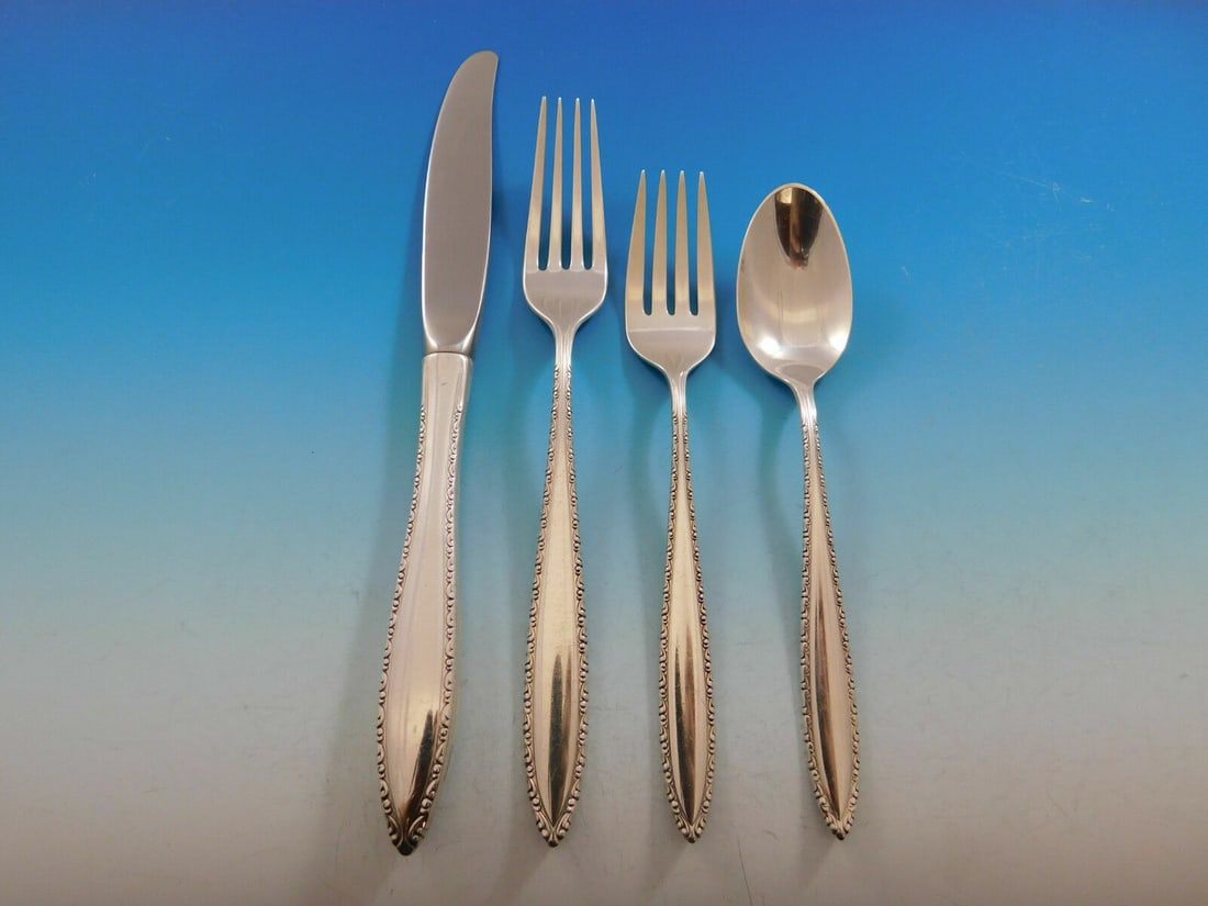 Wallace Michele Sterling Silver 4-Piece Place Setting: Wallace Michele Sterling Silver 4-Piece Place Setting Enhance your dining experience with this exquisite 4-piece place setting in the Michele pattern by Wallace. Crafted from high-quality sterling sil