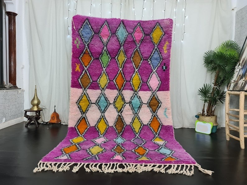 Authentic Pink Handmade Moroccan Berber Wool Rug 10 x 5 Feet: Authentic Pink Handmade Moroccan Berber Wool Rug 10 x 5 Feet Elevate your space with this stunning Pink Handmade Moroccan Berber Wool Rug, expertly handwoven in the Middle Atlas Mountains by skilled l