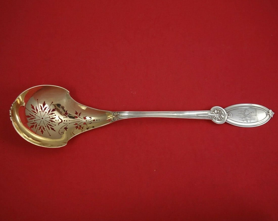 Wendt Union Sterling Silver Oyster Ladle 11.5" Gold Wash Flower Design: Wendt Union Sterling Silver Oyster Ladle 11.5" Gold Wash Flower Design This exquisite oyster ladle, crafted by Wendt, is a stunning example of sterling silver artistry. Measuring 11 1/2 inches, it fea