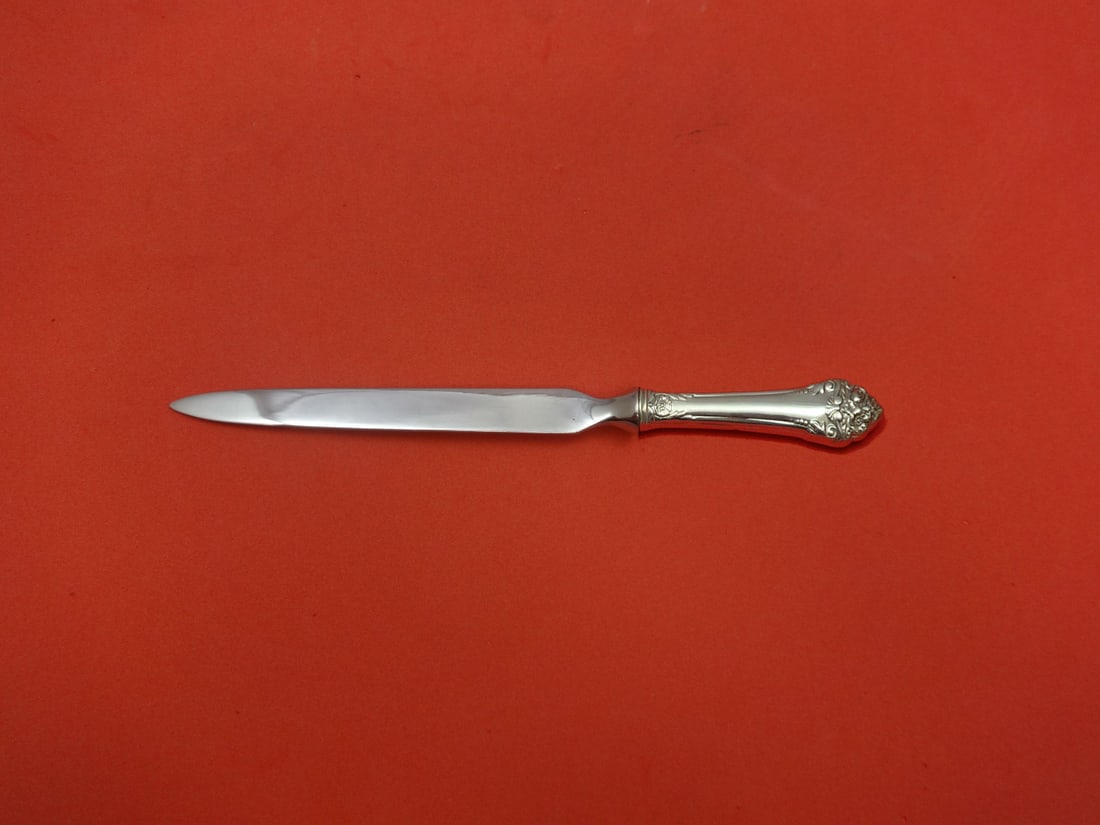 Reed & Barton Fragrance Sterling Silver Letter Opener Custom Made 8": Reed & Barton Fragrance Sterling Silver Letter Opener Custom Made 8" This exquisite letter opener by Reed & Barton showcases a beautiful design in sterling silver. The piece features a hollow handle c