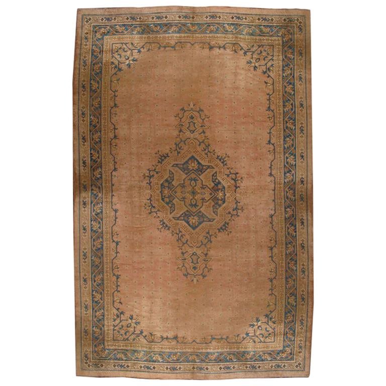 Edwardian Salmon Antique Oushak Carpet 16'4 x 25'4 Hand-Woven Wool Turkey: Edwardian Salmon Antique Oushak Carpet 16'4 x 25'4 Hand-Woven Wool Turkey This impressive antique Oushak carpet, originating from Turkey, showcases a stunning blend of colors, featuring an intriguing 