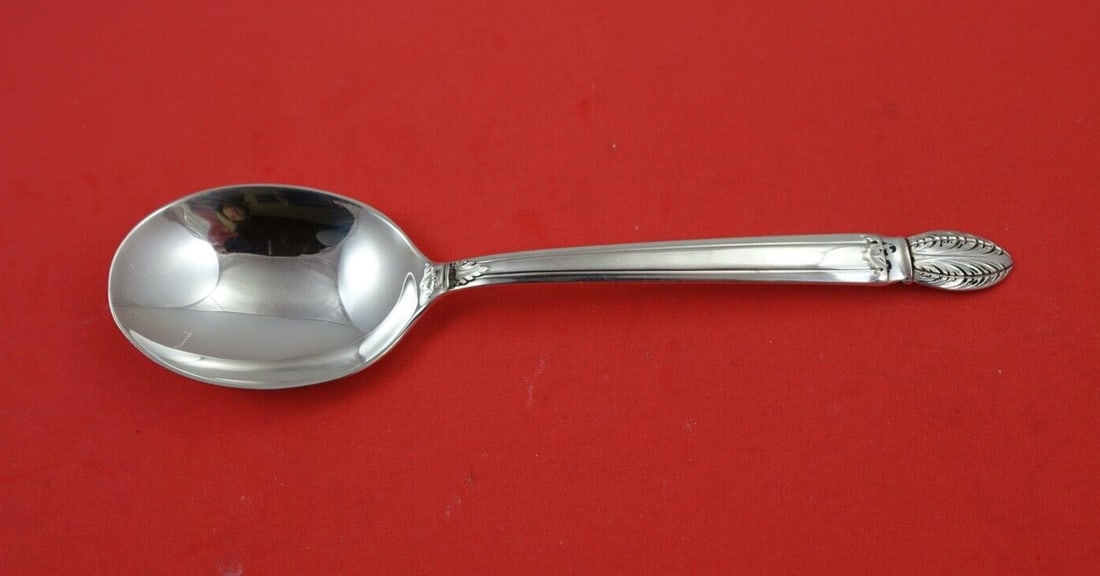 Reed and Barton Colonial Classic Sterling Silver Gumbo Spoon 7 1/8": Reed and Barton Colonial Classic Sterling Silver Gumbo Spoon 7 1/8" This Colonial Classic gumbo spoon by Reed and Barton is an elegant serving piece crafted from sterling silver. Measuring 7 1/8 inche