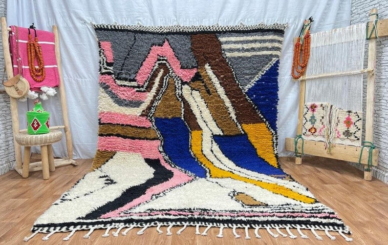 Authentic Handwoven Colorful Rug 100% Sheep Wool Morocco 10 x 5 Feet: Authentic Handwoven Colorful Rug 100% Sheep Wool Morocco 10 x 5 Feet Discover the beauty of this Lovely Authentic Colorful Rug, handwoven by skilled Berber women in the Atlas Mountains of Morocco. Cra