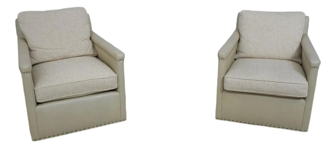 Set of Two White Faux Leather Swivel Lounge Chairs Modern Style: Set of Two White Faux Leather Swivel Lounge Chairs Modern Style This pair of CR Laine swivel lounge chairs features a modern, mid-century inspired design with textured faux leather upholstery in white
