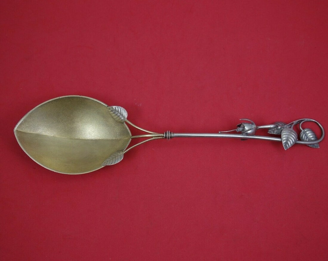 Whiting Fuchsia Sterling Silver Berry Spoon Gold Washed 10 1/8": Whiting Fuchsia Sterling Silver Berry Spoon Gold Washed 10 1/8" This exquisite berry spoon from the Fuchsia pattern by Whiting is crafted from sterling silver and features a stunning gold washed and f