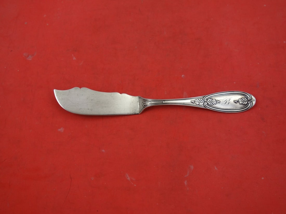 Albert Pitts Olive Coin Silver Master Butter Knife 7": Albert Pitts Olive Coin Silver Master Butter Knife 7" This exquisite master butter knife, measuring 7 inches, is crafted from coin silver and features the elegant Olive pattern designed by Albert Pitt