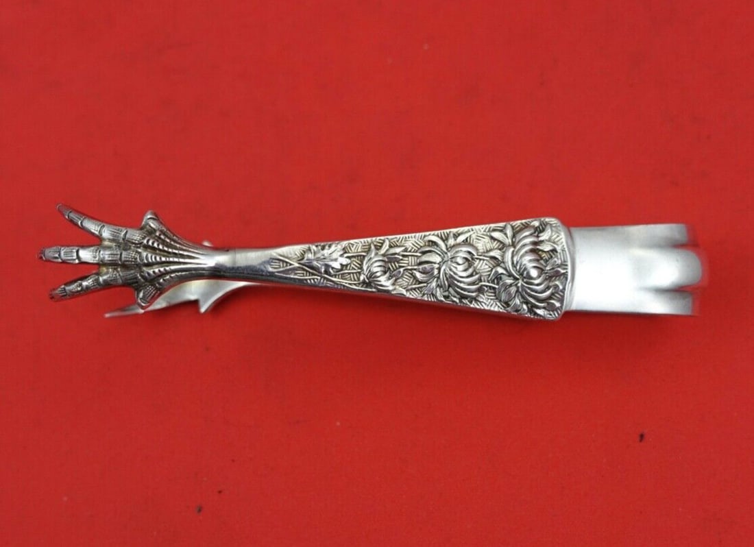 Shiebler Chrysanthemum Sterling Silver Sugar Tong 4 1/4 Inches: Shiebler Chrysanthemum Sterling Silver Sugar Tong 4 1/4 Inches This exquisite sugar tong is crafted from sterling silver and features the elegant Chrysanthemum pattern by Shiebler. Measuring 4 1/4 inc