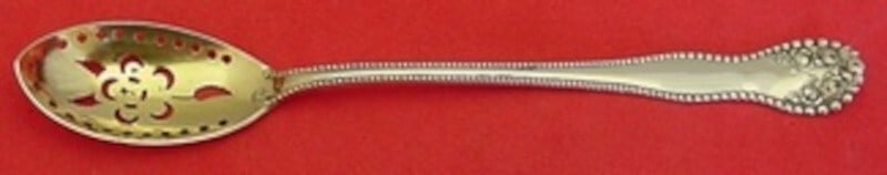 Gorham Lancaster Sterling Silver Olive Spoon 5 7/8 Gold Wash Pierced: Gorham Lancaster Sterling Silver Olive Spoon 5 7/8 Gold Wash Pierced Explore the elegance of the Lancaster pattern by Gorham with this exquisite Sterling Silver Olive Spoon. Measuring 5 7/8 inches, th