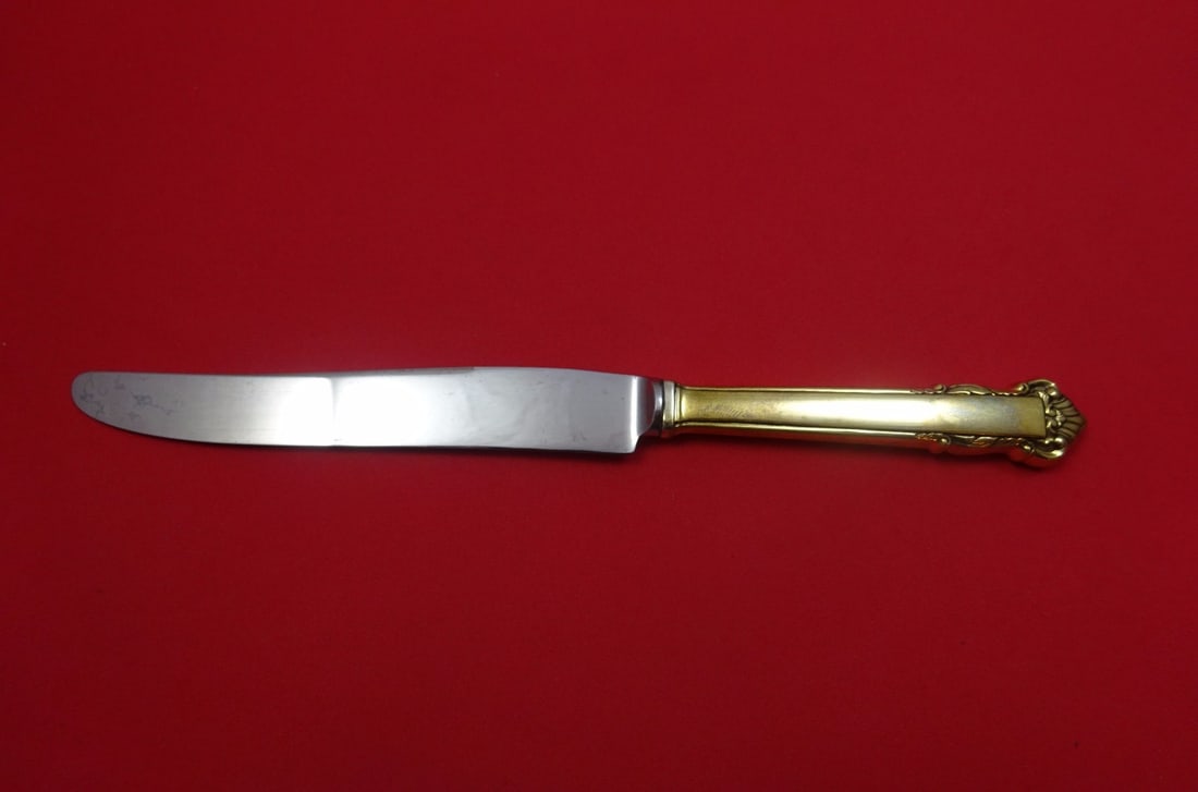Lunt English Shell Vermeil Sterling Silver Knife 8 7/8": Lunt English Shell Vermeil Sterling Silver Knife 8 7/8" This exquisite English Shell Vermeil regular knife features a hollow handle made of sterling silver with a durable stainless steel blade. Design