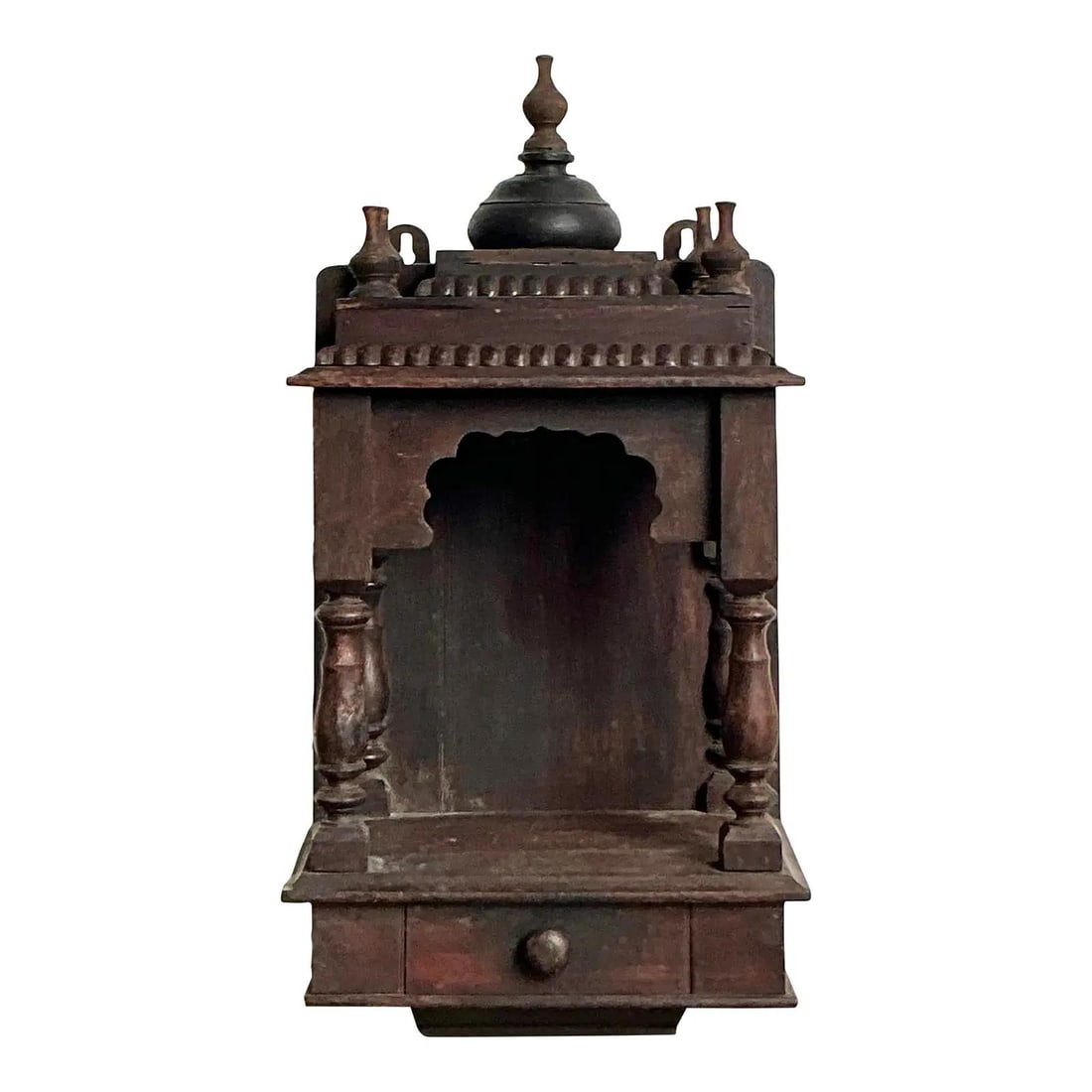 Carved Wooden Temple Shrine with Onion Dome Finial and Drawer: Carved Wooden Temple Shrine with Onion Dome Finial and Drawer This vintage carved wood tabletop altar features an architectural design inspired by traditional temples, including a tiered roof with a c