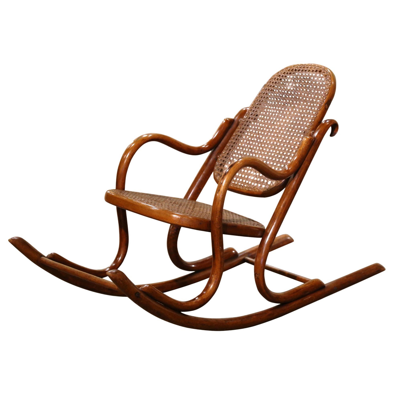 French Art Deco Bentwood Child Rocker with Cane Seat: French Art Deco Bentwood Child Rocker with Cane Seat This early 20th-century French child rocking chair is crafted in the Thonet style, featuring a steam-bent beechwood frame with elegant, continuous 