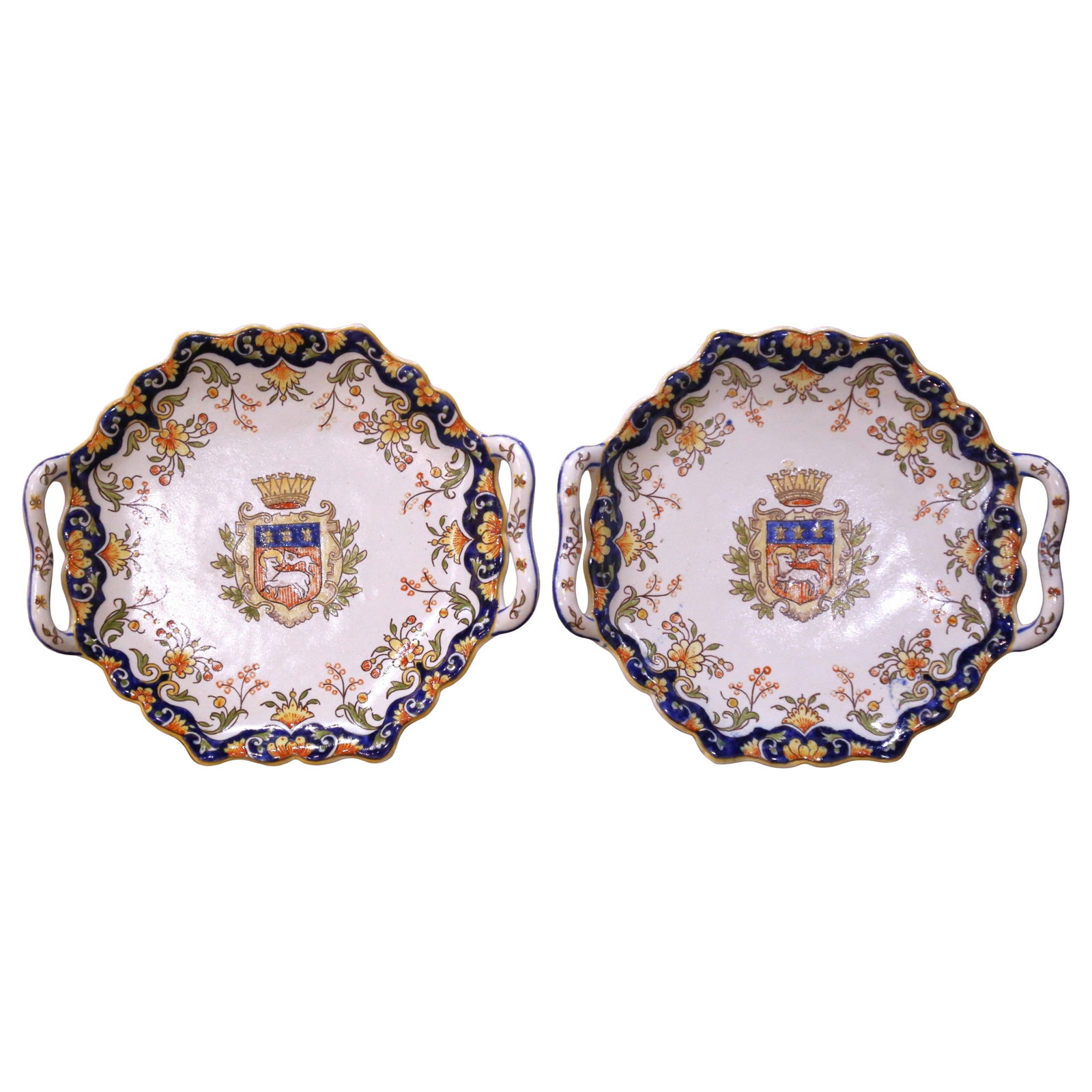 Set of 2 Rouen Faience Armorial Wall Platters: Set of 2 Rouen Faience Armorial Wall Platters This elegant pair of early 20th century French Rouen faience wall platters features a scalloped form with integrated side handles and is richly hand-paint