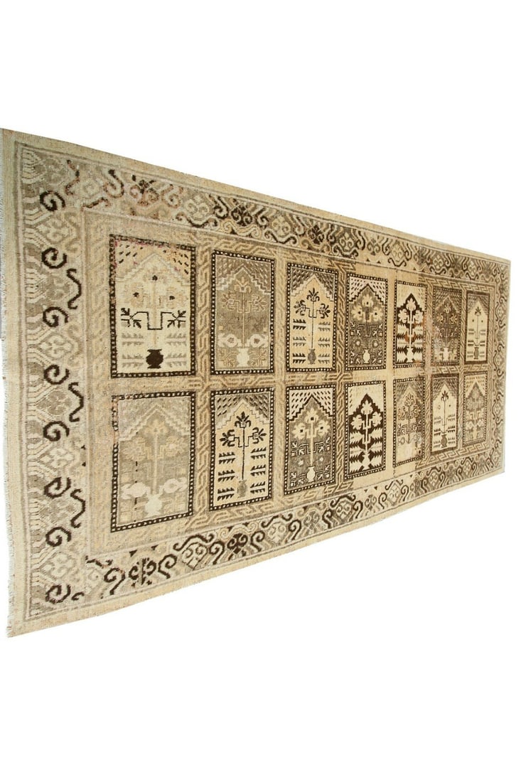 Antique Khotan Hand Knotted Wool Geometric Area Rug 5 x 9 6: Antique Khotan Hand Knotted Wool Geometric Area Rug 5 x 9 6 This rare antique Khotan area rug, handmade in East Turkestan circa 1890, features a distinctive geometric design. Expertly hand-knotted fro