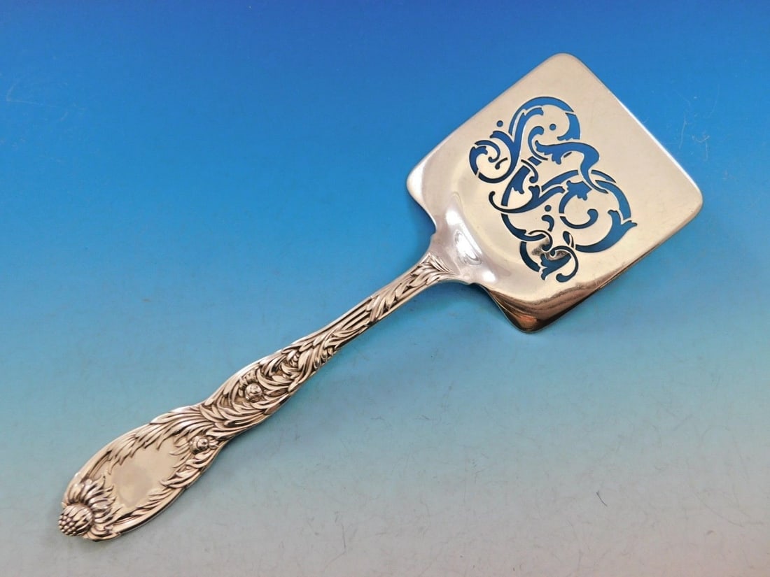 Tiffany Co Chrysanthemum Sterling Silver Pierced Waffle Server 9 EDS: Tiffany Co Chrysanthemum Sterling Silver Pierced Waffle Server 9 EDS This sterling silver waffle server is crafted in the Chrysanthemum pattern by Tiffany & Co., designed in 1880 by Charles Grosjean. 