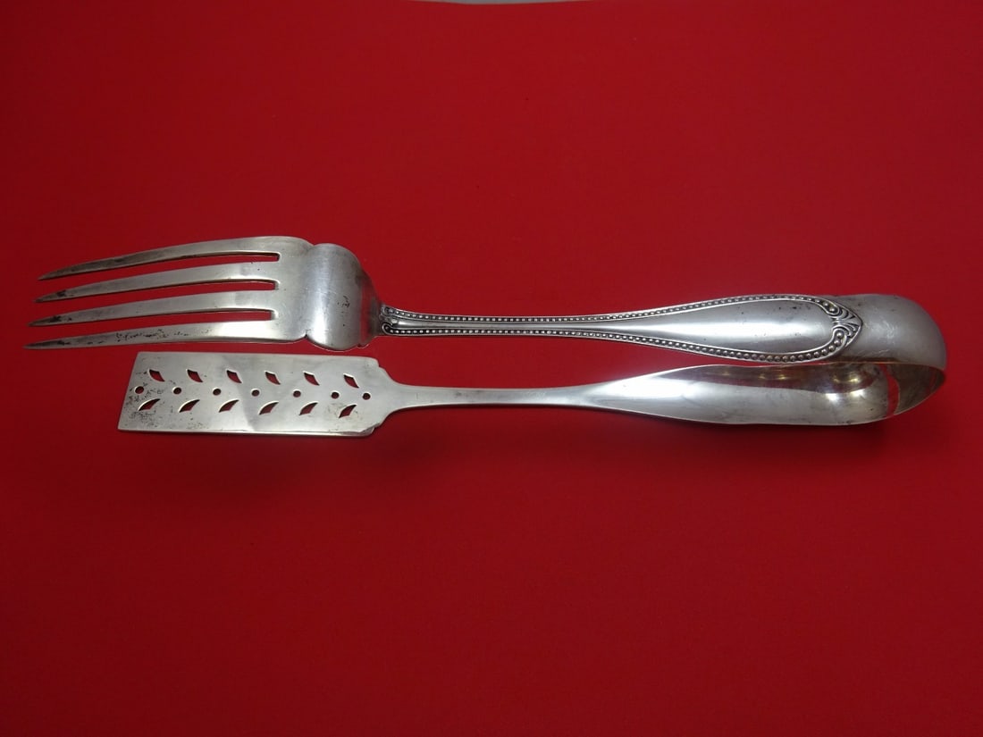 Unique Coin Silver Asparagus Tong 10 1/2" Monogrammed Tines One Side: Unique Coin Silver Asparagus Tong 10 1/2" Monogrammed Tines One Side Discover this unique Coin Silver Asparagus Tong, measuring 10 1/2 inches in length. Crafted from high-quality coin silver, this pie