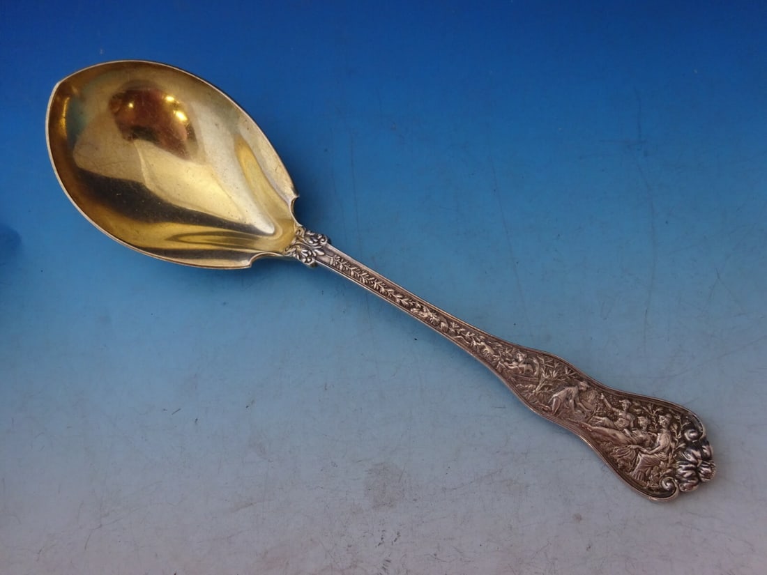 Tiffany & Co Olympian Gold Washed Sterling Silver Berry Spoon 9" Monogrammed: Tiffany & Co Olympian Gold Washed Sterling Silver Berry Spoon 9" Monogrammed This exquisite berry spoon is part of the Olympian pattern by Tiffany & Co., crafted from high-quality sterling silver and 