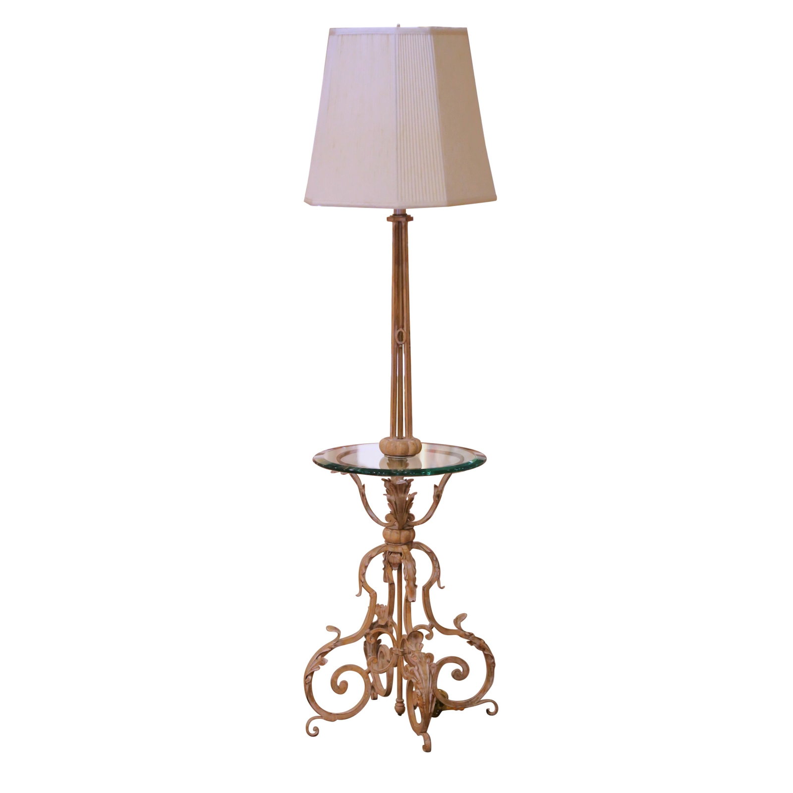 French Louis XV Style Wrought Iron Floor Lamp With Glass Shelf Circa 1960: French Louis XV Style Wrought Iron Floor Lamp With Glass Shelf Circa 1960 This mid-century French floor lamp, crafted circa 1960, features a Louis XV-inspired wrought iron structure with a gilt patina