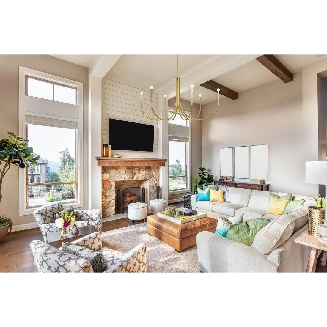 Living District Layne 6 Light Brass Farmhouse Chandelier 50 Inch: Living District Layne 6 Light Brass Farmhouse Chandelier 50 Inch This large six-light chandelier features a brass color metal frame in a modern farmhouse style, inspired by wrought iron design. Suitab