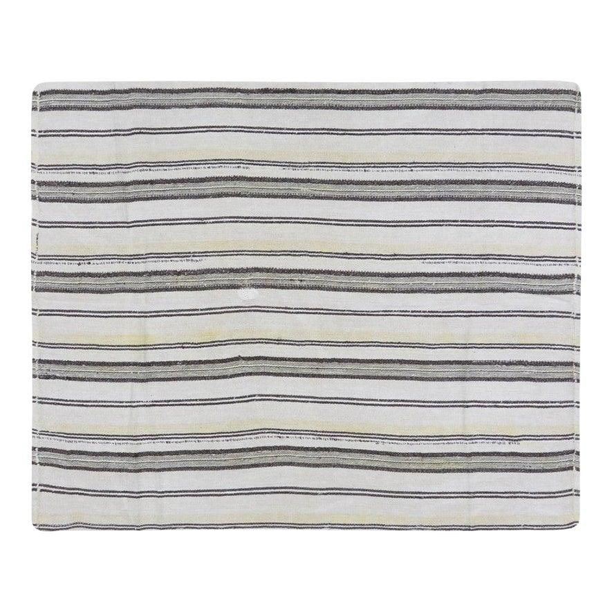 Vintage Turkish Wool Flatweave Kilim Rug 5'3x6'3: Vintage Turkish Wool Flatweave Kilim Rug 5'3x6'3 This vintage Turkish hand-knotted flatweave kilim is crafted from wool using traditional rug-making techniques. It features a timeless design that comb