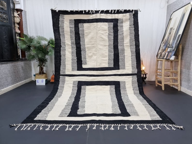 Handwoven Moroccan Rug 100% Local Sheep Wool 10 x 6.56 Feet: Handwoven Moroccan Rug 100% Local Sheep Wool 10 x 6.56 Feet Experience the beauty of handcrafted artistry with this lovely authentic rug. Handwoven by local Berber women in the Atlas Mountains, this r
