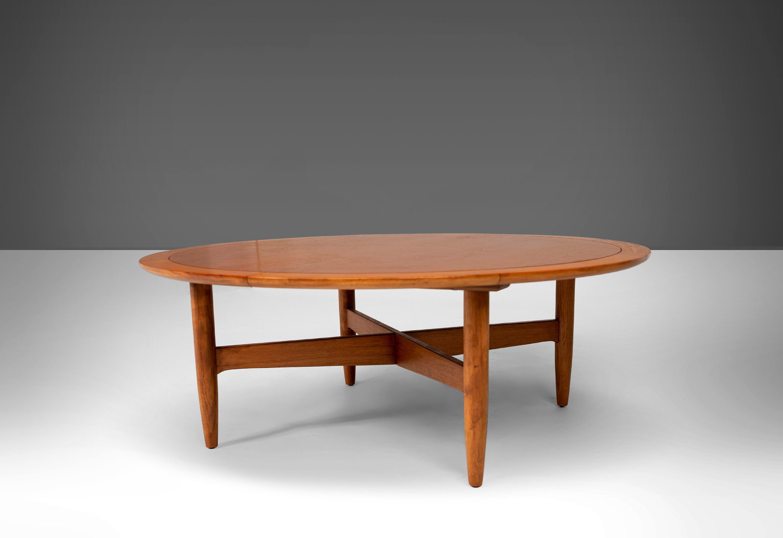 1960s Round Pecan Coffee Table by Lubberts & Mulder for Tomlinson: 1960s Round Pecan Coffee Table by Lubberts & Mulder for Tomlinson This Round Coffee Table, attributed to Lubberts & Mulder for Tomlinson, captures the essence of Mid-Century Modern and Scandinavian de