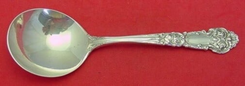 Reed & Barton French Renaissance Sterling Silver Cream Soup Spoon 5 7/8": Reed & Barton French Renaissance Sterling Silver Cream Soup Spoon 5 7/8" This exquisite cream soup spoon is crafted from high-quality sterling silver by Reed & Barton, showcasing the elegant French Re