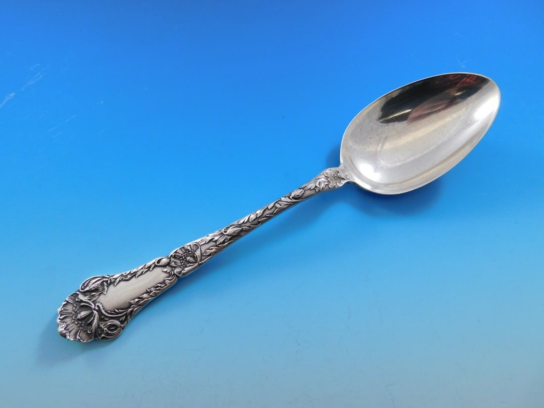 Gorham Poppy Sterling Silver 8 1/2 Serving Spoon: Gorham Poppy Sterling Silver 8 1/2 Serving Spoon A Gorham serving spoon in the Poppy pattern, made of sterling silver and measuring 8 1/2 inches long. It dates to the 1900-1940 period, was made in the
