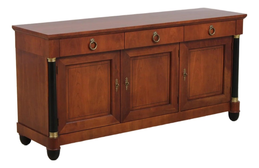 Baker Palladian Cherry Wood Sideboard with 3 Doors 3 Drawers: Baker Palladian Cherry Wood Sideboard with 3 Doors 3 Drawers This Baker French Empire sideboard from the Palladian Collection is crafted from cherry wood and features adjustable shelves, dovetailed dr