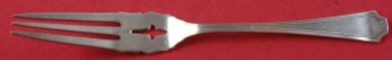 Durgin-Gorham Fairfax Sterling Silver Lemon Fork 5 1/8 Inch: Durgin-Gorham Fairfax Sterling Silver Lemon Fork 5 1/8 Inch Introducing the Fairfax Sterling Silver Lemon Fork, a beautiful piece from Durgin-Gorham. This serving fork features a pierced design with s