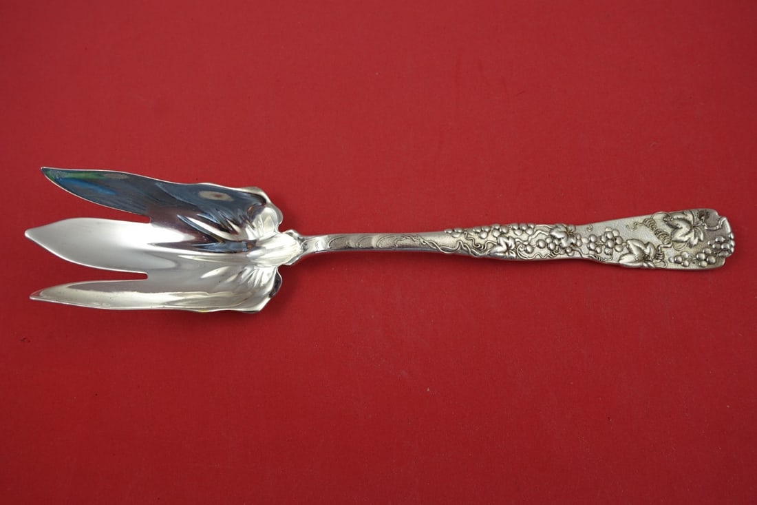 Tiffany & Co Vine Sterling Silver Salad Serving Fork Grape Motif 10.5": Tiffany & Co Vine Sterling Silver Salad Serving Fork Grape Motif 10.5" Discover the elegance of this salad serving fork from the renowned Vine pattern by Tiffany & Co. Crafted from high-quality sterli
