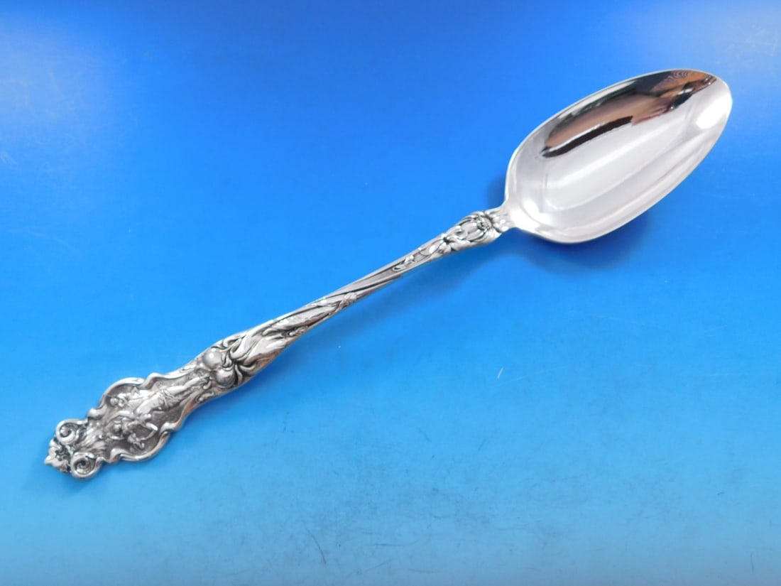 Wallace Irian Art Nouveau Sterling Silver Serving Spoon 11.5": Wallace Irian Art Nouveau Sterling Silver Serving Spoon 11.5" This exquisite serving spoon is a stunning example of Art Nouveau design, crafted by Wallace in the Irian pattern. Made from high-quality 