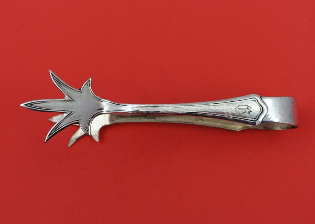 Wallace Washington Hand Hammered Sterling Silver Ice Tong 6 3/8": Wallace Washington Hand Hammered Sterling Silver Ice Tong 6 3/8" Enhance your serving experience with this exquisite Washington Hand Hammered Ice Tong by Wallace. Crafted from high-quality sterling si