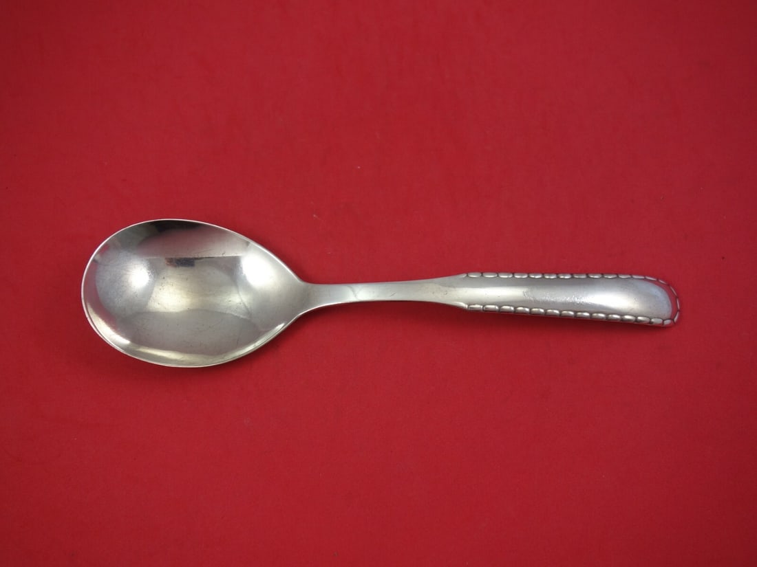 Georg Jensen Rope Sterling Silver 10 Inch Berry Spoon: Georg Jensen Rope Sterling Silver 10 Inch Berry Spoon This elegant serving spoon, part of the renowned Rope pattern by Georg Jensen, is crafted from high-quality sterling silver. Measuring 10 inches, 