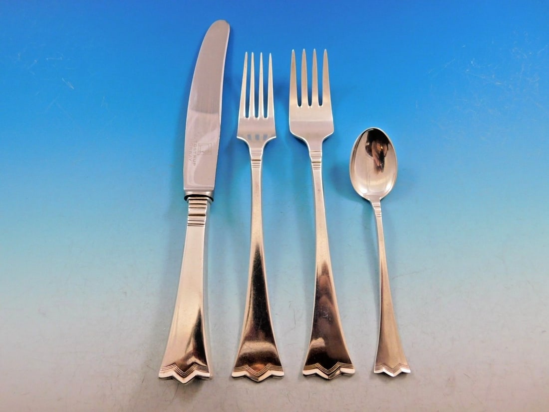 J Tostrup Kronesolv Sterling Silver Flatware Set 24 Pieces with Towle Caddy: J Tostrup Kronesolv Sterling Silver Flatware Set 24 Pieces with Towle Caddy Discover the elegance of the Kronesolv flatware set by J. Tostrup, featuring 24 exquisite pieces crafted from sterling silve