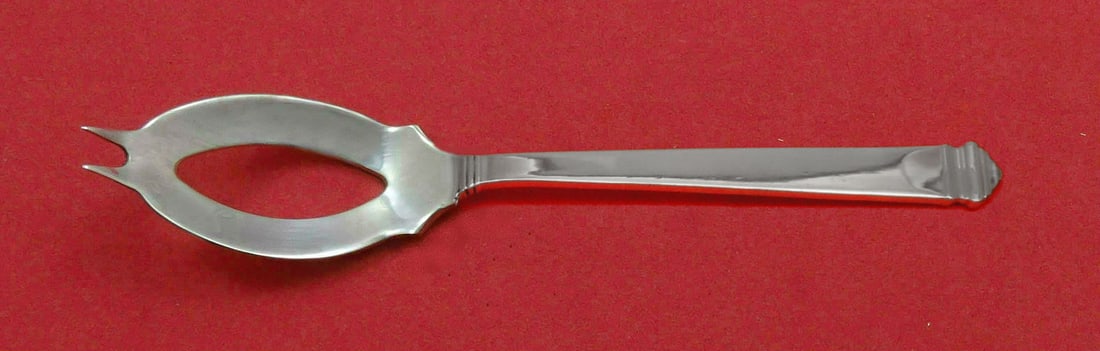 Tiffany & Co. Hampton Sterling Silver Olive Spoon 5 3/4 Inch Custom Made: Tiffany & Co. Hampton Sterling Silver Olive Spoon 5 3/4 Inch Custom Made This exquisite serving spoon features the Hampton pattern by Tiffany & Co., crafted from high-quality sterling silver. Measurin